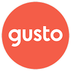 Red Gusto logo.